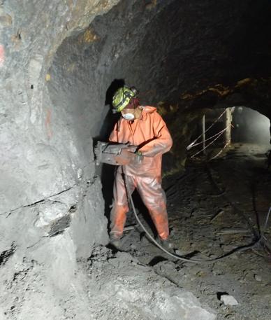 A picture containing ground, outdoor, nature, cave Description automatically generated