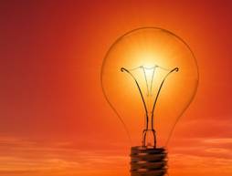 A picture containing orange, sunset, light Description automatically generated