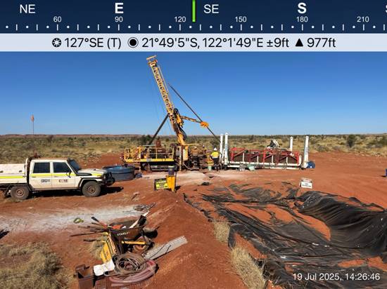 A truck and a crane in a field AI-generated content may be incorrect.