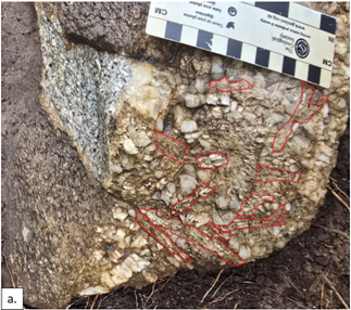 A rock with red lines on it AI-generated content may be incorrect.