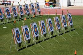 A group of targets on grass AI-generated content may be incorrect.
