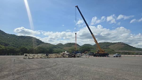 A crane lifting a crane AI-generated content may be incorrect.