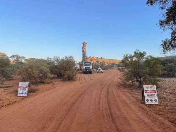 A truck on a dirt road AI-generated content may be incorrect.