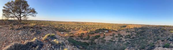 A landscape with a blue sky AI-generated content may be incorrect.