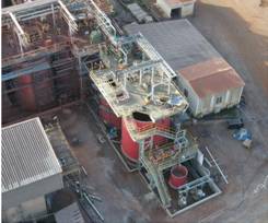 Aerial view of a factory AI-generated content may be incorrect.