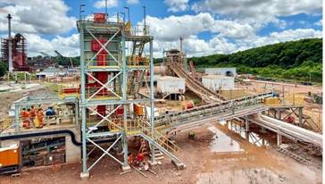 A large metal structure with a conveyor belt AI-generated content may be incorrect.