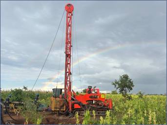 A machine in a field AI-generated content may be incorrect.