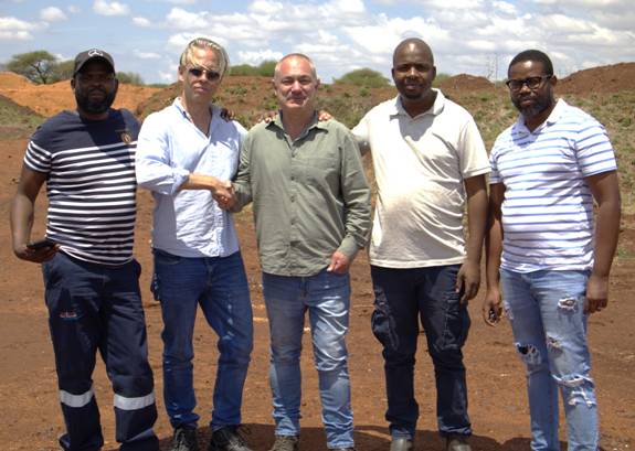 A group of men standing together AI-generated content may be incorrect.