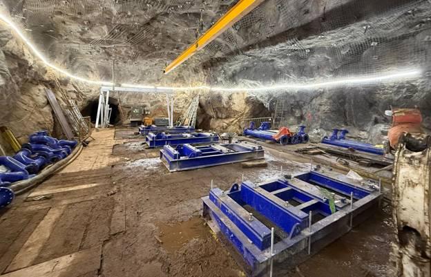 A large room with blue objects in it AI-generated content may be incorrect.