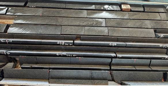 A stack of rectangular metal bars AI-generated content may be incorrect.