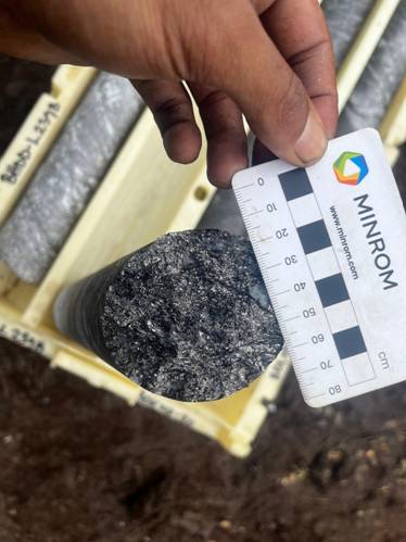 A person holding a measuring tape AI-generated content may be incorrect.