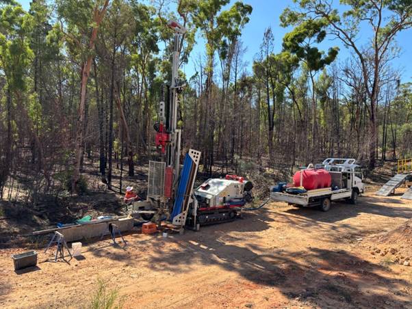 A truck and machine in a forest AI-generated content may be incorrect.