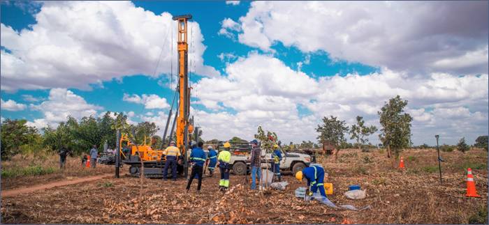 A picture containing sky, outdoor, outdoor object, farm machine Description automatically generated