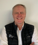 A person smiling at the camera AI-generated content may be incorrect.