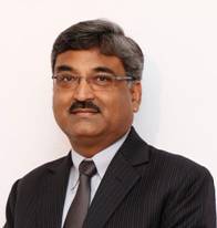 A person in a suit and tie AI-generated content may be incorrect.