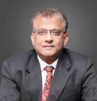 A person in a suit and tie AI-generated content may be incorrect.