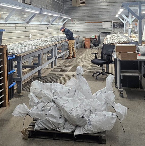 A person in a warehouse AI-generated content may be incorrect.