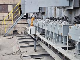A large machine with wires and cables AI-generated content may be incorrect.