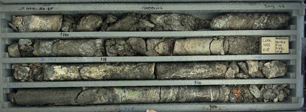 The image shows a collection of rock samples, each labeled with a unique identifier, and accompanied by various measurements and data points. AI-generated content may be incorrect.