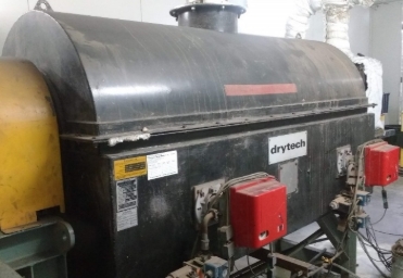 A large black machine with a red box  AI-generated content may be incorrect.
